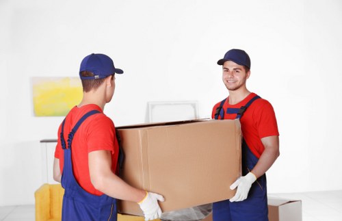 Harrow Movers staff loading furniture efficiently and safely