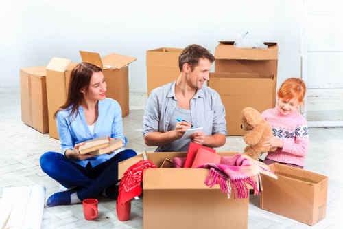 Furniture removals team loading household items in Harrow