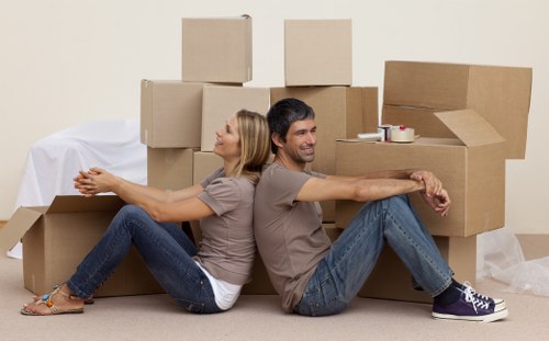 Professional office relocation team handling equipment in a Harrow workplace
